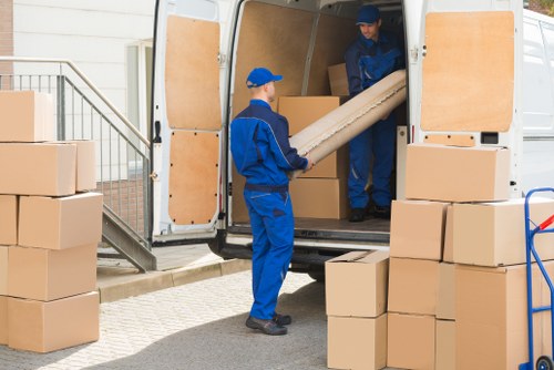 Removal team helping with a residential move in Belsize Park