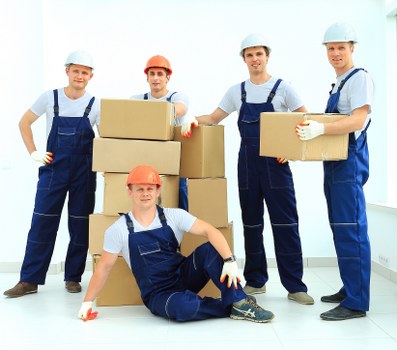 Boxes and furniture arranged for a residential or office move in Belsize Park