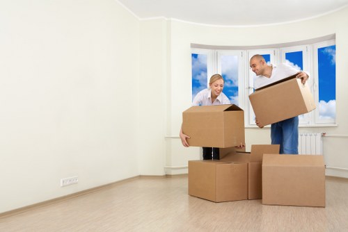 Careful packing of office equipment and documents for a local move