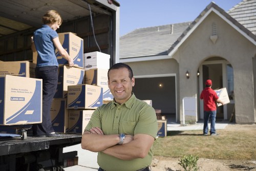 Local moving team handling fragile items in Belsize Park