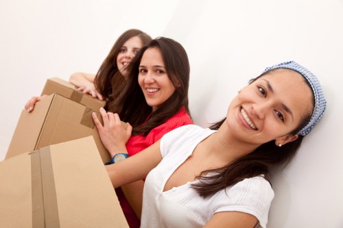 Preparing desks, boxes, and equipment for an office move in Belsize Park