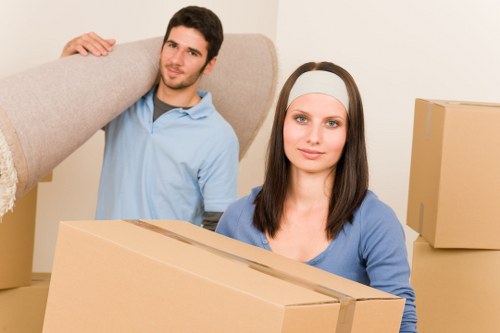 Moving team handling office relocation logistics in a narrow street
